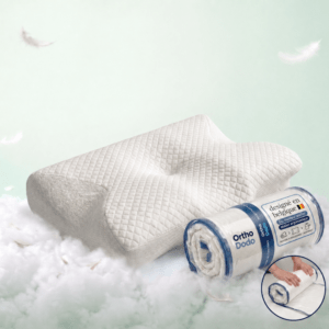 Vue d'ensemble de l'oreiller ergonomique OrthoDodo avec son packaging de transport compressé. Le sachet mentionne 'Designé en Belgique' avec drapeau belge, 'Élu meilleur oreiller' et 'Oreiller ergonomique'. Présence des badges de livraison gratuite pour la France et la Belgique